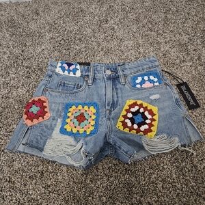 Blank NYC Denim Shorts with Vibrant Crochet Accents